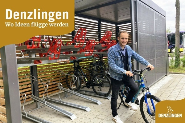 Denzlingen - Wo Ideen fl&uuml;gge werden. Fahrradsammelschlie&szlig;anlage und Person mit blauem Fahrrad